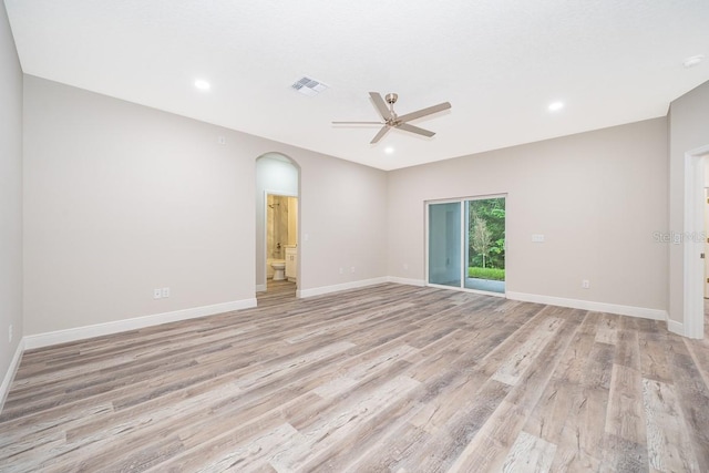 spare room with ceiling fan and light hardwood / wood-style floors