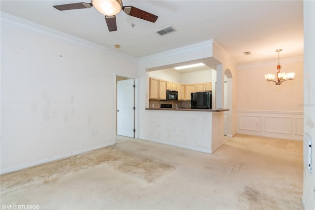 interior space featuring crown molding, light colored carpet, and ceiling fan with notable chandelier