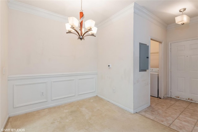 interior space with washer / dryer, electric panel, light carpet, and crown molding