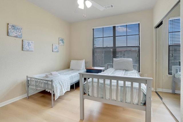 909 Charo Pkwy Unit 1021, Davenport, FL 33897 - bedroom featuring wood finished floors and ceiling fan