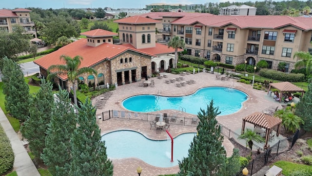 view of swimming pool featuring a gazebo and a patio