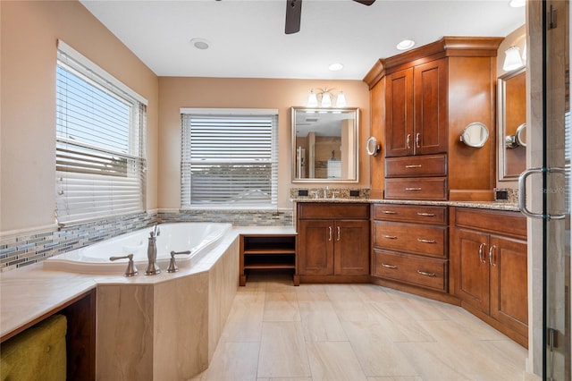 bathroom with vanity, ceiling fan, plus walk in shower, and tasteful backsplash