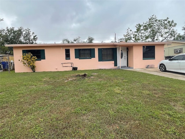 single story home with a front yard