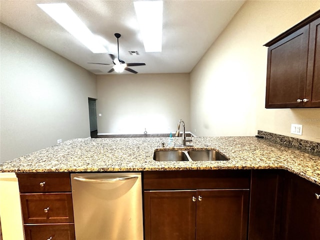 kitchen with ceiling fan, sink, light stone counters, dishwasher, and kitchen peninsula