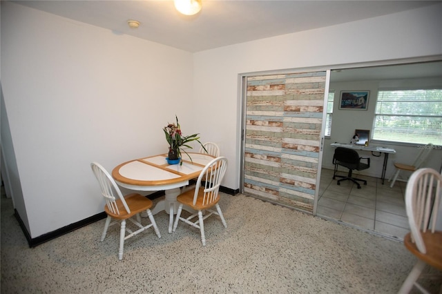 dining room featuring tile patterned floors