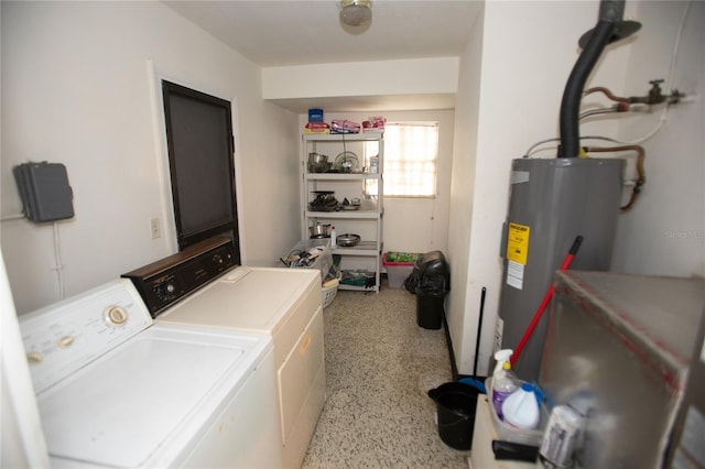 washroom featuring water heater and washer and dryer