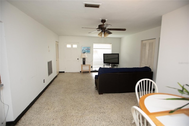 living room with ceiling fan