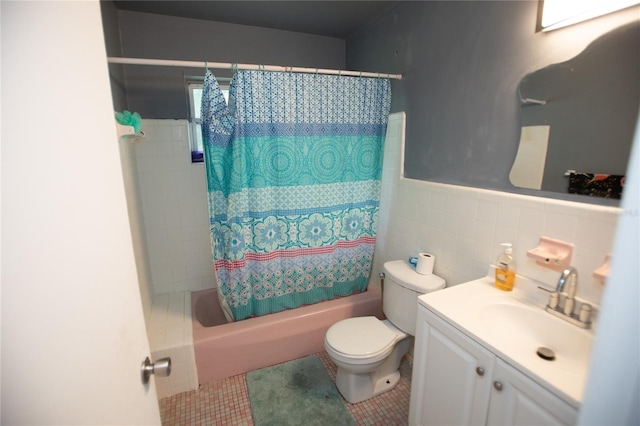 full bathroom featuring vanity, tile walls, tile patterned floors, shower / bath combo, and toilet