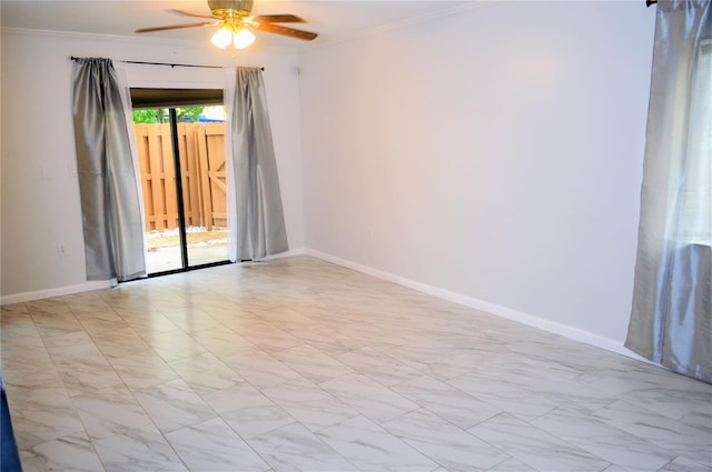 spare room with ceiling fan and ornamental molding