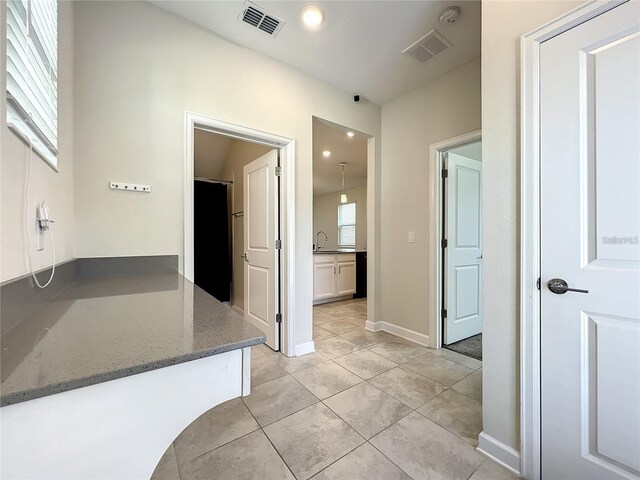 13041 Inkwell Aly, Winter Garden, FL 34787 - full bath with visible vents, tile patterned flooring, baseboards, and a sink