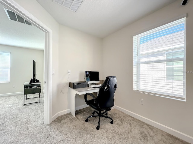 13041 Inkwell Aly, Winter Garden, FL 34787 - carpeted home office with baseboards, visible vents, and a healthy amount of sunlight