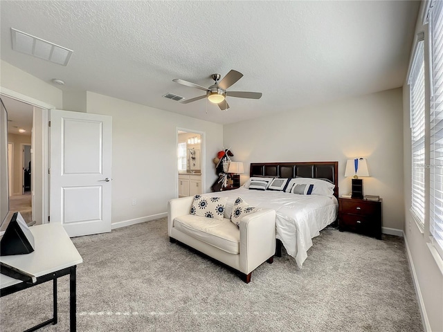 13041 Inkwell Aly, Winter Garden, FL 34787 - bedroom featuring visible vents, baseboards, and light carpet