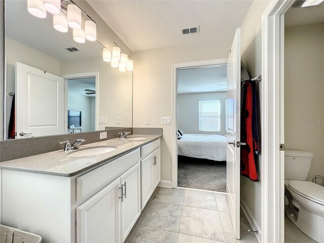 13041 Inkwell Aly, Winter Garden, FL 34787 - ensuite bathroom featuring ensuite bath, a sink, and visible vents