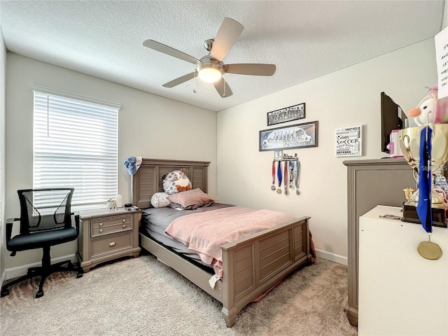 13041 Inkwell Aly, Winter Garden, FL 34787 - bedroom featuring ceiling fan, baseboards, a textured ceiling, and light colored carpet