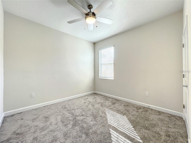 13041 Inkwell Aly, Winter Garden, FL 34787 - empty room with carpet floors, a ceiling fan, a textured ceiling, and baseboards