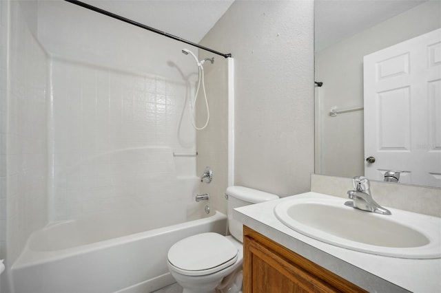 full bathroom featuring shower / bathing tub combination, vanity, and toilet