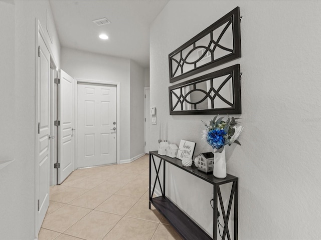 interior space with light tile patterned floors