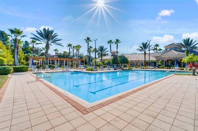 view of swimming pool featuring a patio