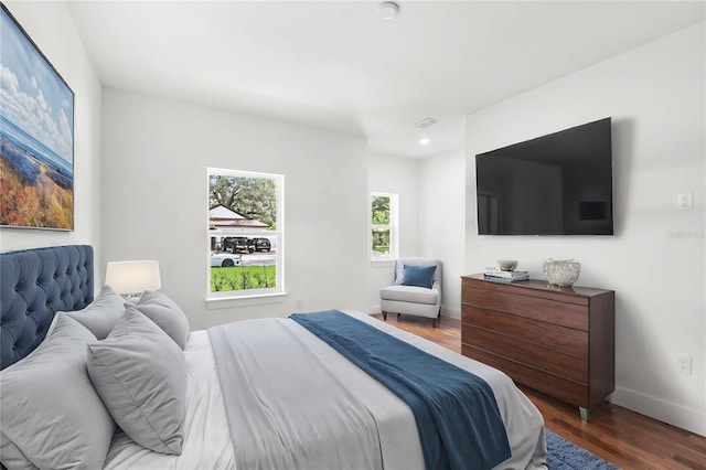 bedroom featuring dark hardwood / wood-style floors