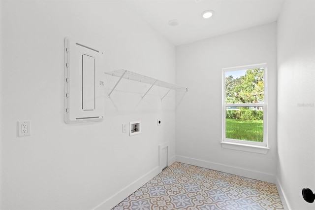 laundry room featuring hookup for an electric dryer, electric panel, and washer hookup