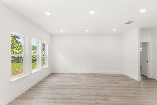 634 Burch Ave, Winter Garden, FL 34787 - empty room with recessed lighting, baseboards, and light wood-style flooring