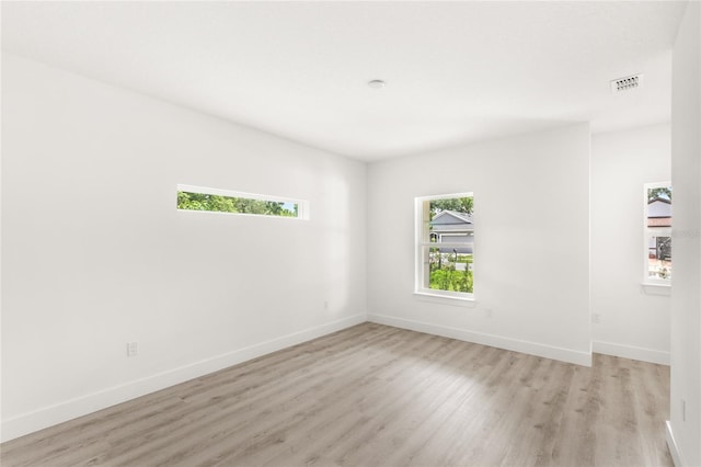 634 Burch Ave, Winter Garden, FL 34787 - empty room with light wood-type flooring and baseboards