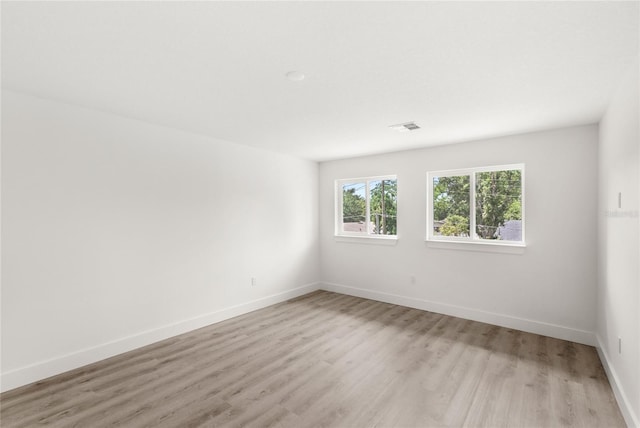 634 Burch Ave, Winter Garden, FL 34787 - unfurnished room featuring light wood-style floors and baseboards