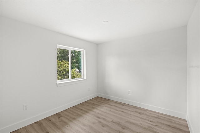 634 Burch Ave, Winter Garden, FL 34787 - unfurnished room with baseboards and light wood-type flooring