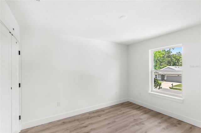 634 Burch Ave, Winter Garden, FL 34787 - unfurnished room with light wood finished floors and baseboards