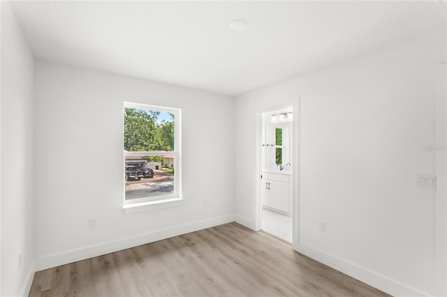 634 Burch Ave, Winter Garden, FL 34787 - unfurnished room featuring light wood-style floors and baseboards