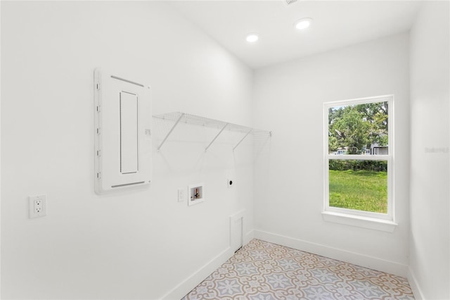 634 Burch Ave, Winter Garden, FL 34787 - laundry room with electric panel, hookup for an electric dryer, baseboards, hookup for a washing machine, and recessed lighting