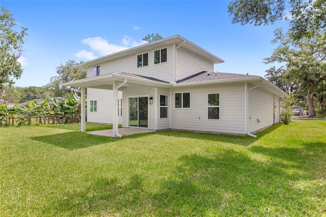 634 Burch Ave, Winter Garden, FL 34787 - rear view of house featuring a patio area and a yard