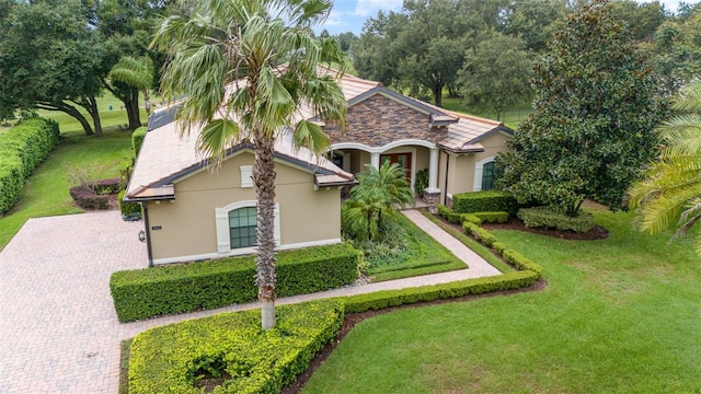 view of front of home with a front yard