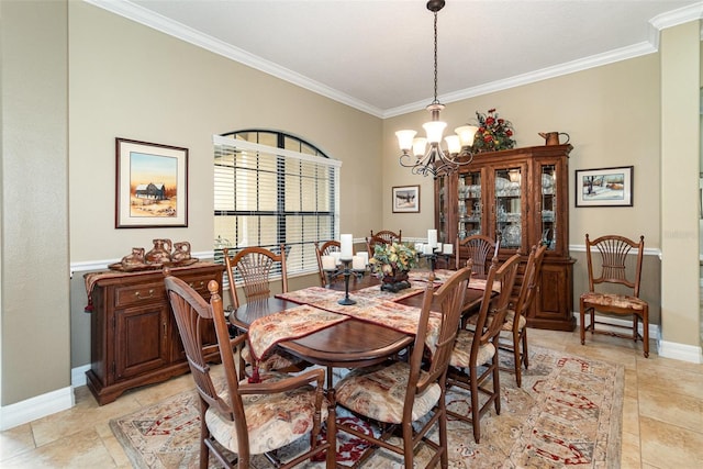 dining room featuring a notable chandelier and ornamental molding