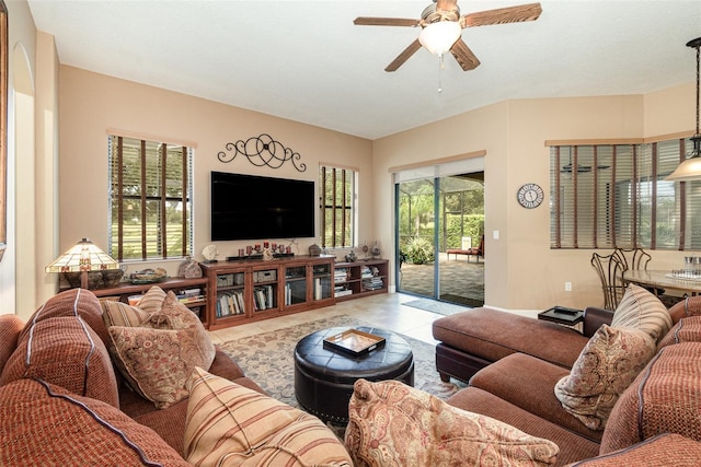 living room with light tile patterned floors and ceiling fan