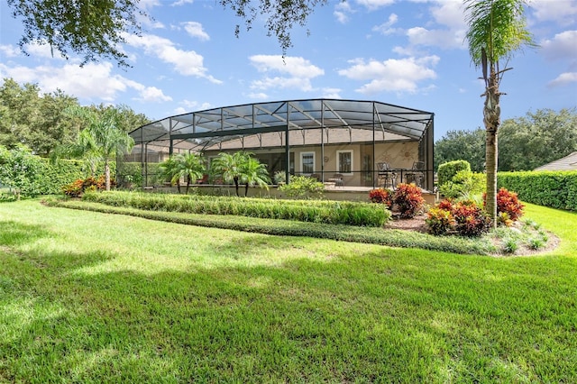 view of yard featuring glass enclosure