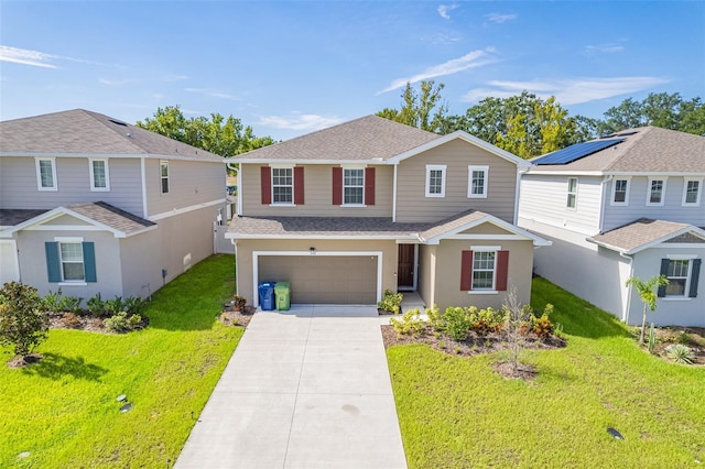 view of front of home with a garage and a front lawn