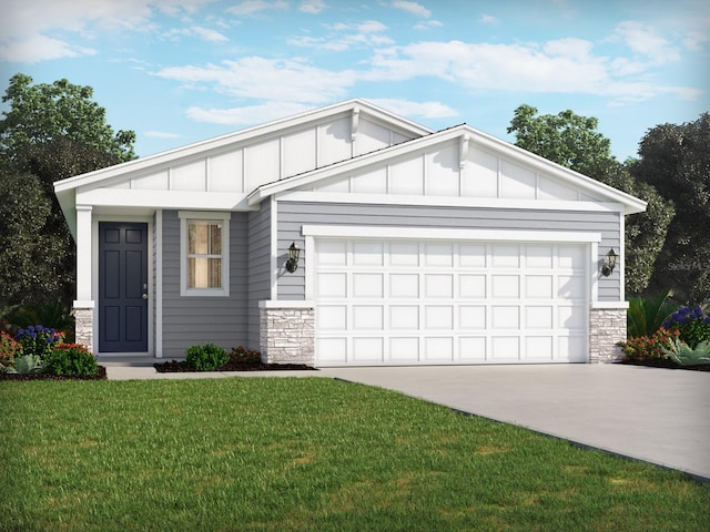 view of front of property featuring a garage and a front lawn