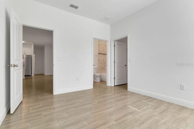 empty room featuring light wood-type flooring