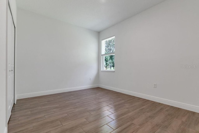 unfurnished room featuring light hardwood / wood-style flooring