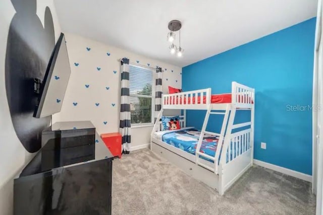 bedroom with light colored carpet