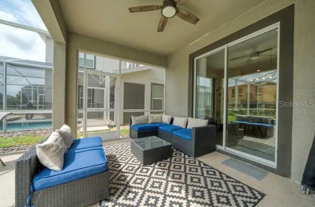 sunroom / solarium with ceiling fan