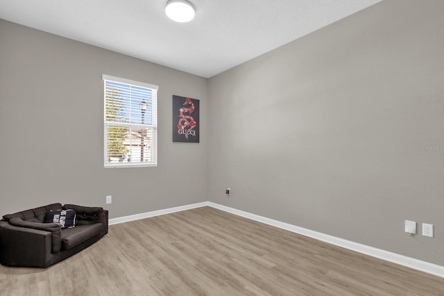 unfurnished room featuring light hardwood / wood-style flooring