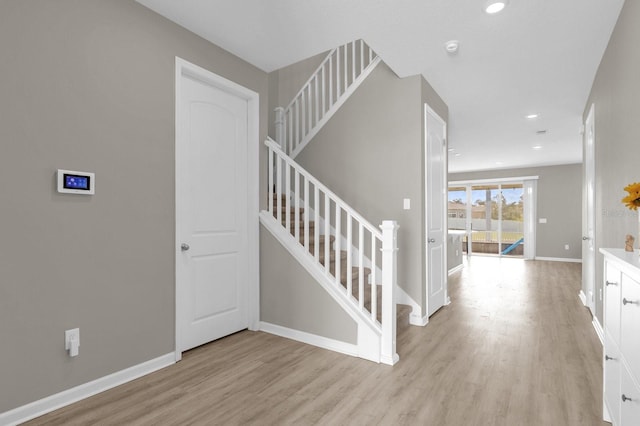 stairway featuring hardwood / wood-style flooring