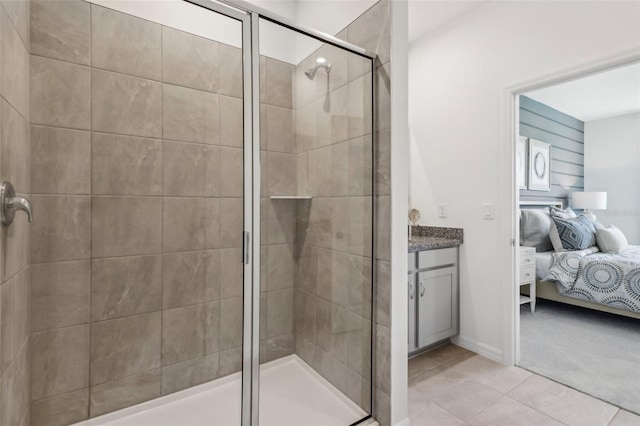 12965 Trovita Dr, Grand Island, FL 32735 - ensuite bathroom with a shower stall, ensuite bath, and tile patterned flooring