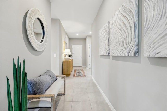 12965 Trovita Dr, Grand Island, FL 32735 - hallway featuring recessed lighting, tile patterned floors, and baseboards