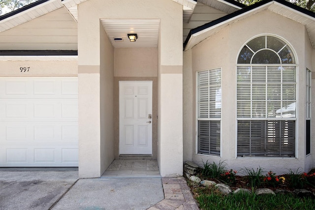 property entrance with a garage