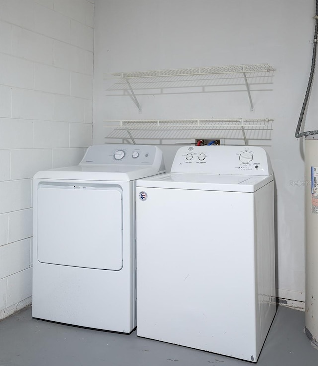 washroom with separate washer and dryer