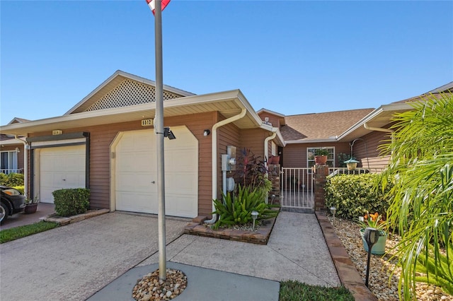 view of front of property featuring a garage