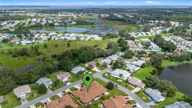 drone / aerial view with a water view